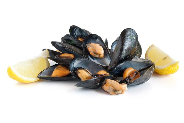 group of mussels boiled with lemon isolated on white background